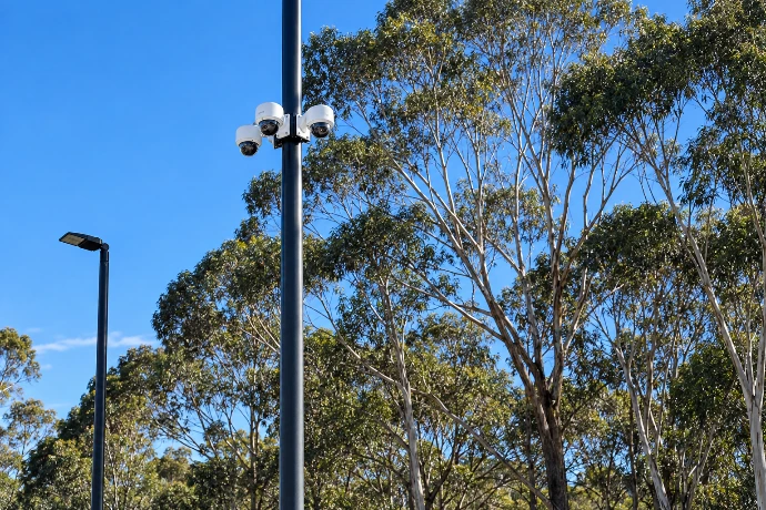 Access control reader installed at a site entry point