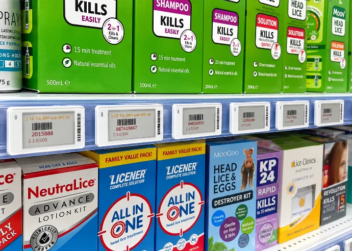 Electronic shelf labels installed on retail shelving